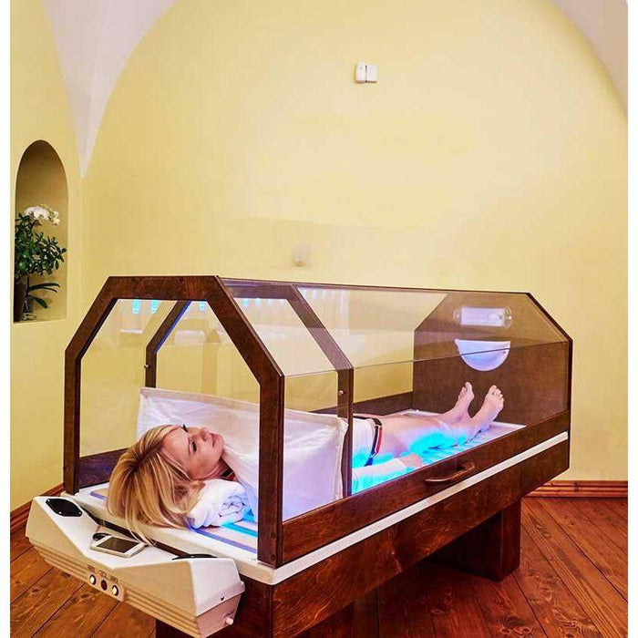 HaloBed™ (Salt Therapy Bed)-Halotherapy-Halotherapy Solutions-woman-in-lying-in-salt-bed-HaloBed™-Therastock